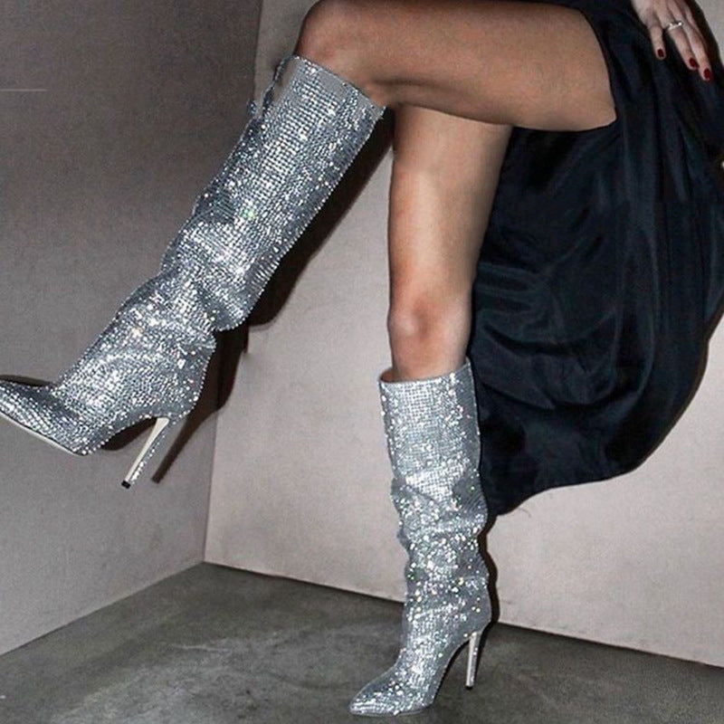 European and American fashion catwalks, star-studded high heels, rhinestone pointed toe knee-high boots.