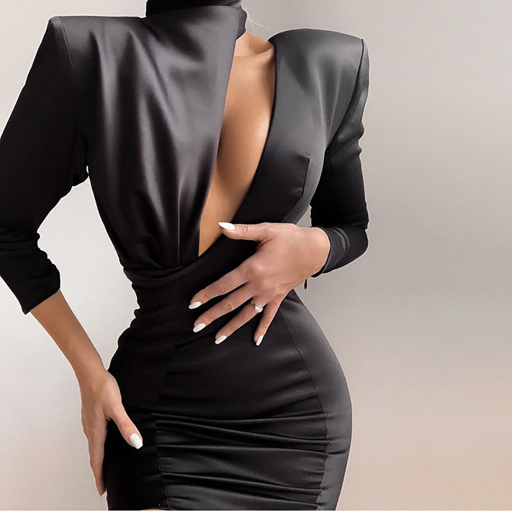 Europe and America solid color round neck long-sleeved hollow oblique shoulder slim package hip dress