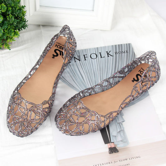 European and American beach flat bird's nest hole shoes plastic crystal jelly shoes hollow mesh sandals