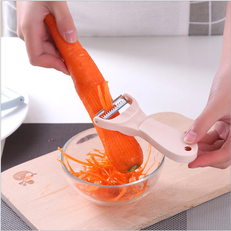 The new two-in-one kitchen multifunctional peeler stainless steel potato fruit grater household fruit peeler