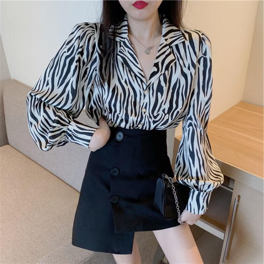 Net red fried street suit female Hong Kong flavor chic lapel loose zebra pattern long sleeve shirt high waist irregular skirt