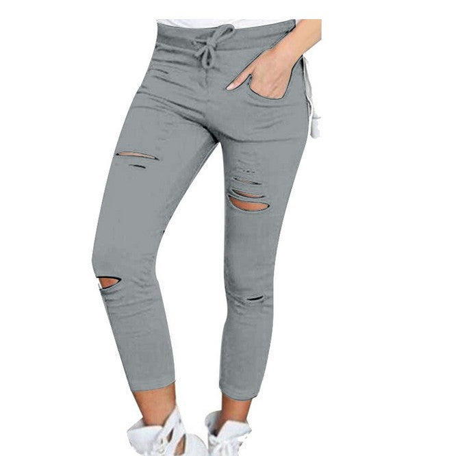 European and American women's clothing ripped casual nine-point pencil pants