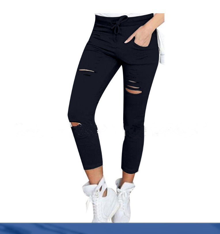 European and American women's clothing ripped casual nine-point pencil pants