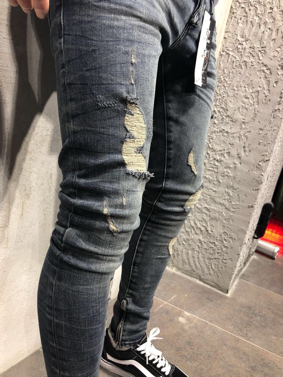 European and American cross-border men's ripped feet jeans