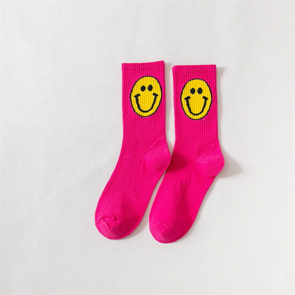 New products Japanese solid color smiley classic basic ladies cotton mid-length tube socks