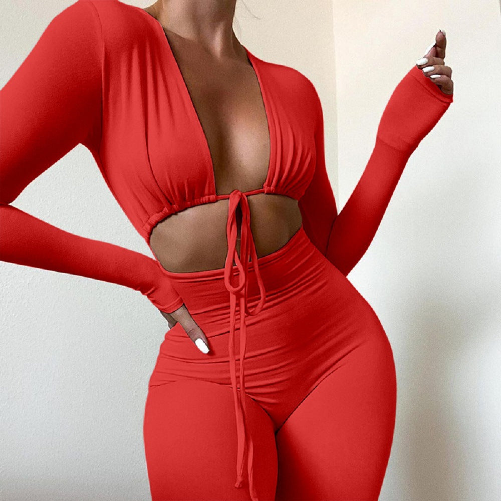 Solid color tight sexy umbilical lace-up hollow long-sleeved slim-fit jumpsuit