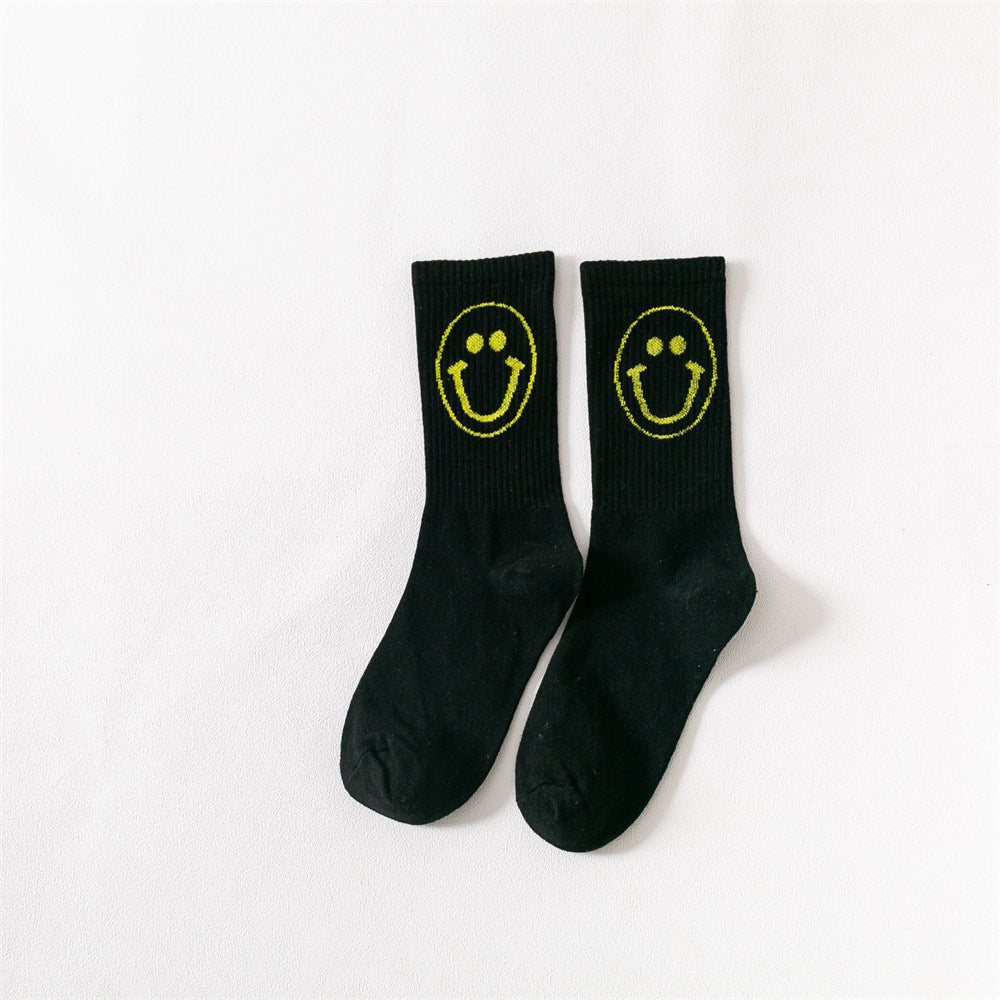 New products Japanese solid color smiley classic basic ladies cotton mid-length tube socks