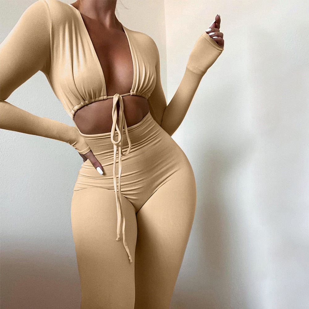 Solid color tight sexy umbilical lace-up hollow long-sleeved slim-fit jumpsuit