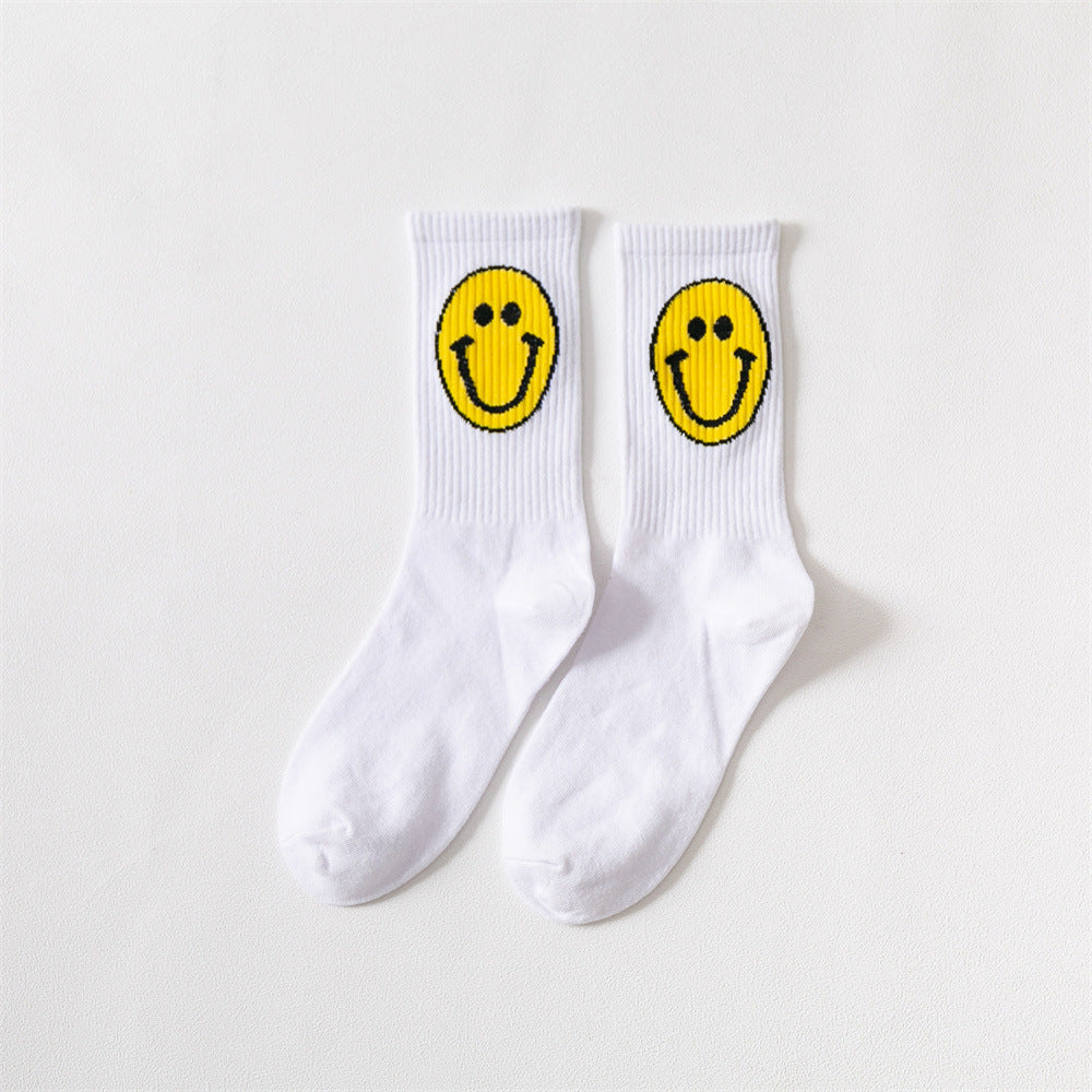 New products Japanese solid color smiley classic basic ladies cotton mid-length tube socks