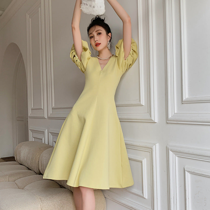 new light yellow V-neck dress women's mid-length puff sleeves French waist A-line skirt