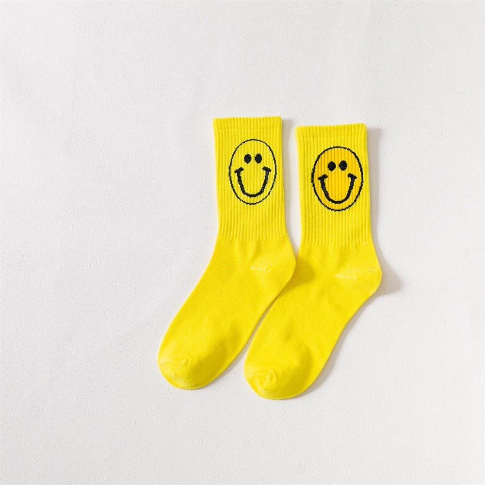 New products Japanese solid color smiley classic basic ladies cotton mid-length tube socks