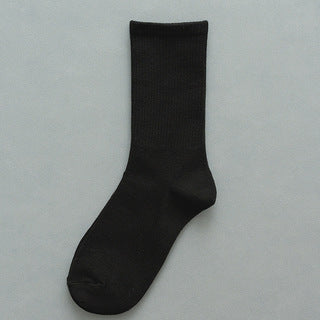 New spring and summer socks female autumn and winter tube socks pure color ins tide sports black white ladies socks