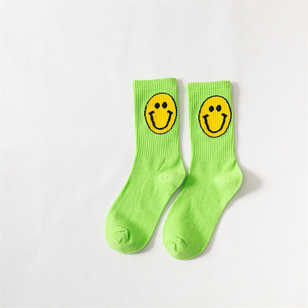 New products Japanese solid color smiley classic basic ladies cotton mid-length tube socks