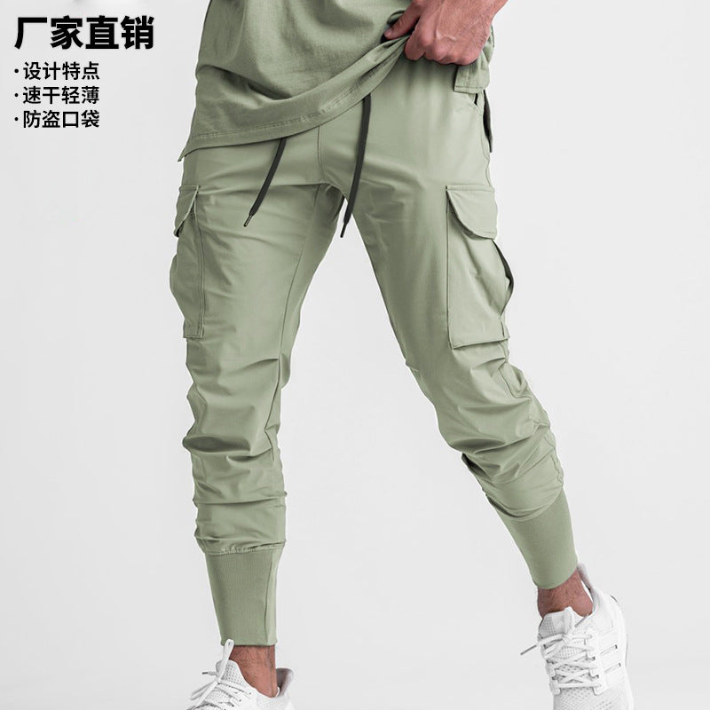 Summer thin ice silk pants men's European and American trend large size casual pants solid color multi-pocket quick-drying pants