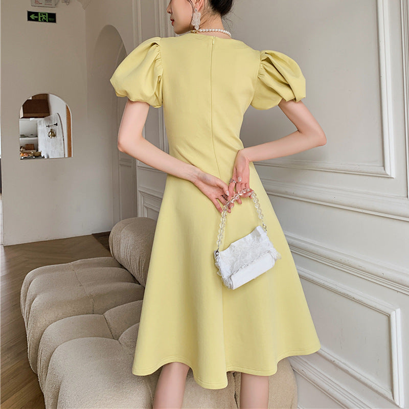 new light yellow V-neck dress women's mid-length puff sleeves French waist A-line skirt