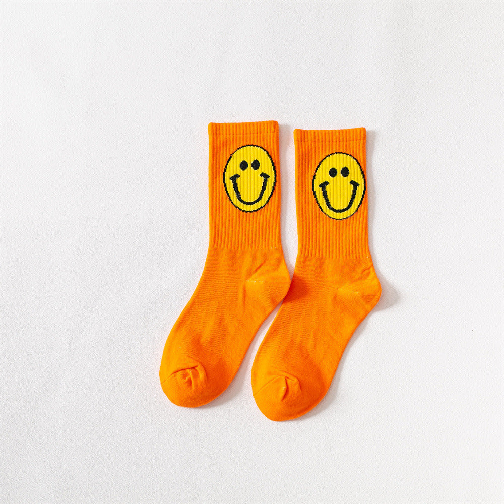 New products Japanese solid color smiley classic basic ladies cotton mid-length tube socks