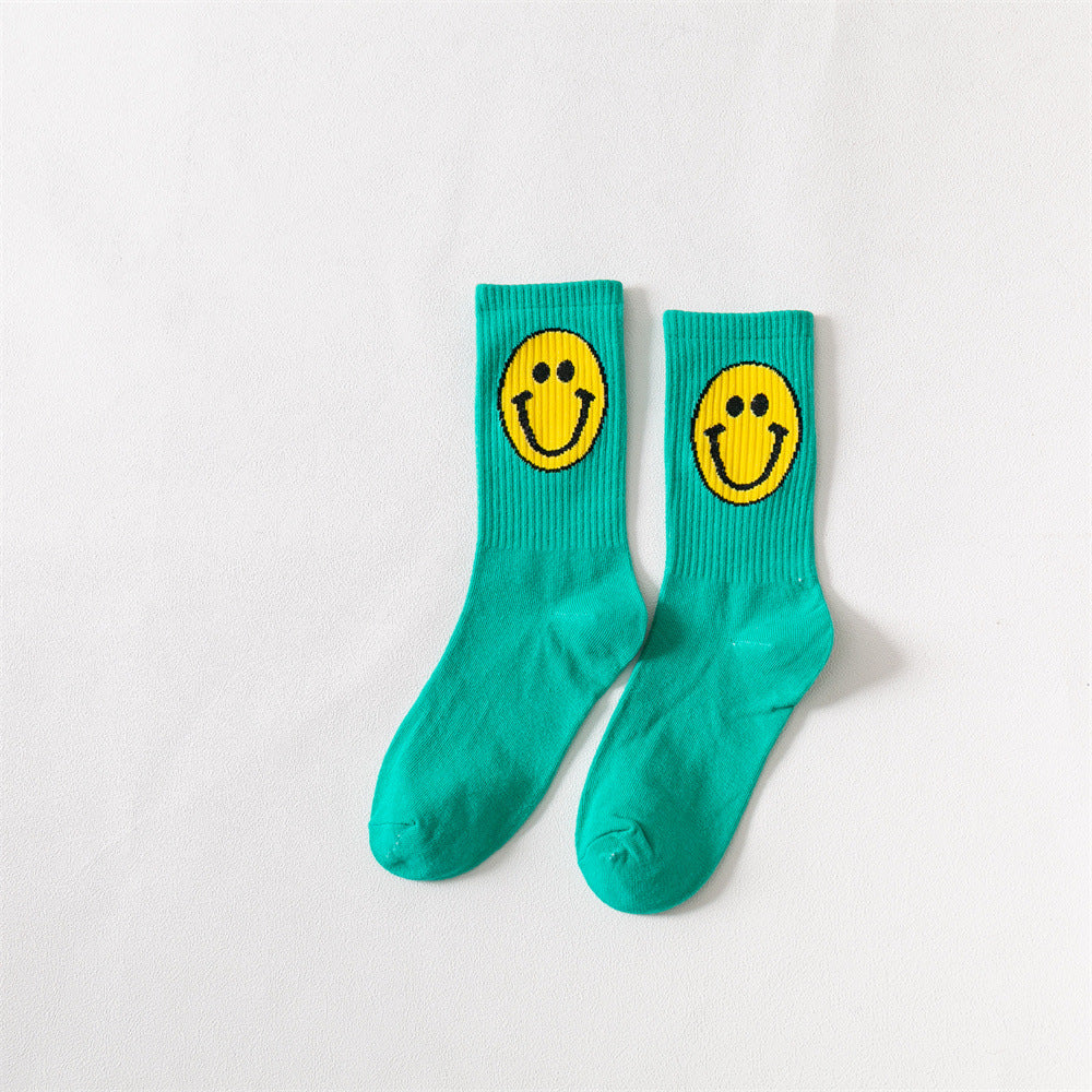 New products Japanese solid color smiley classic basic ladies cotton mid-length tube socks