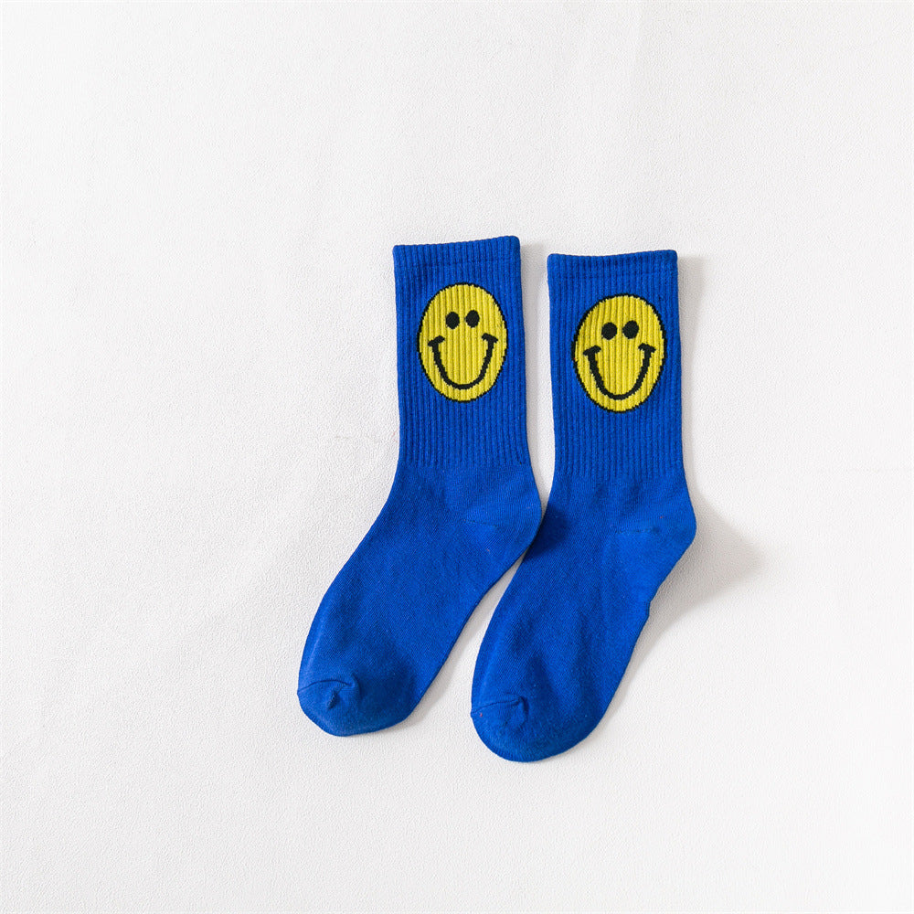 New products Japanese solid color smiley classic basic ladies cotton mid-length tube socks