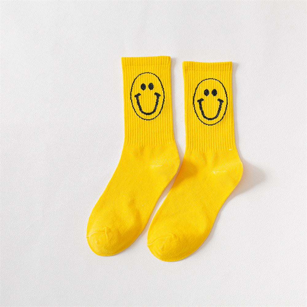 New products Japanese solid color smiley classic basic ladies cotton mid-length tube socks